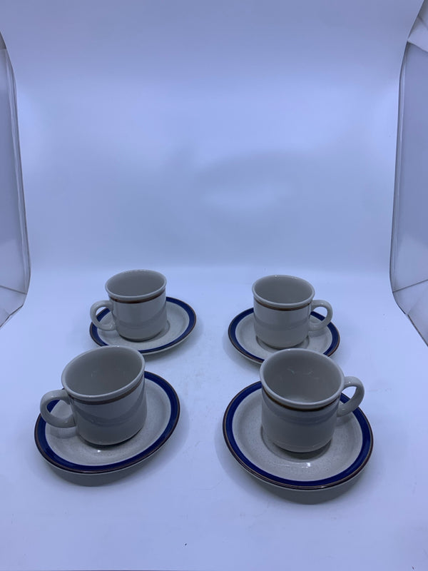 4 BROWN AND BLUE RIM TEA CUPS AND SAUCERS.