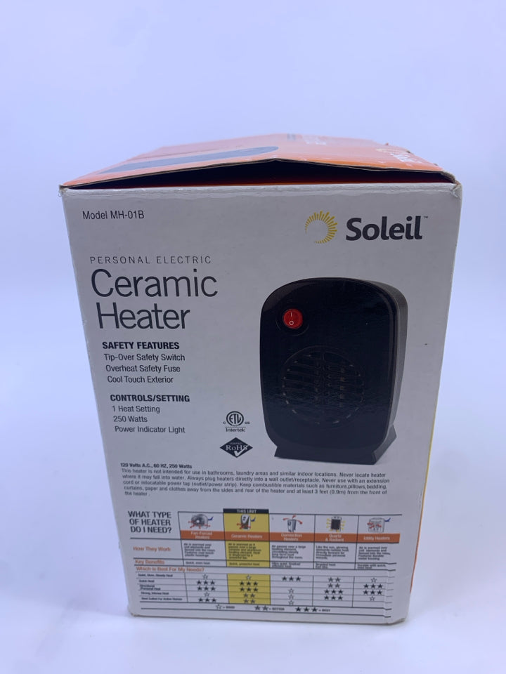 NIB SMALL CERAMIC HEATER.