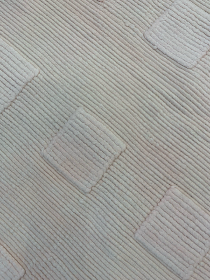 LIGHT PINK RUG W/SQUARE DESIGN.