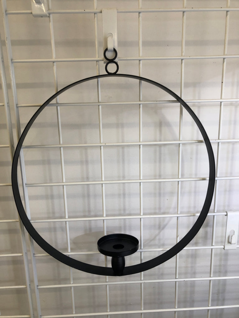 BLACK METAL RING CANDLESTICK HOLDER WALL HANGING.
