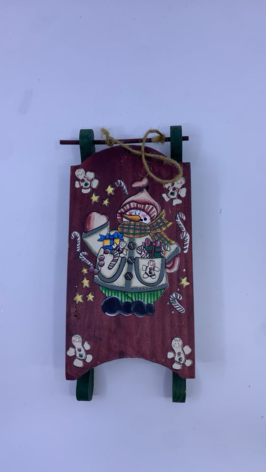 RED/GREEN SNOWMAN HANGING SLED.