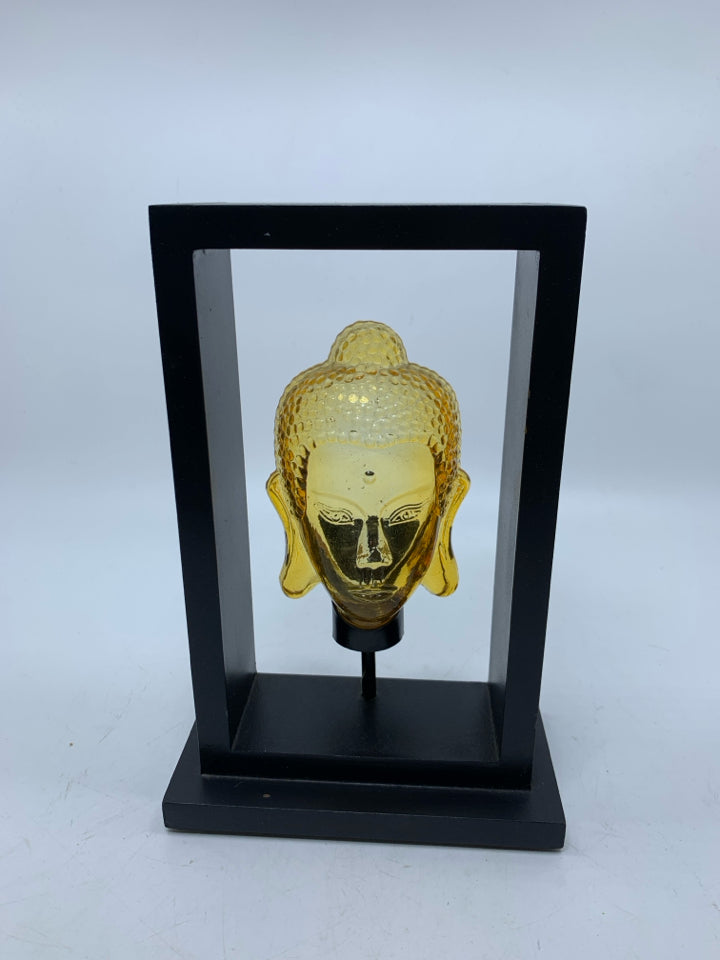 AMBER BUDDHA HEAD TEA LIGHT HOLDER.