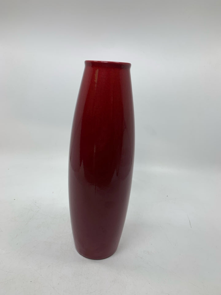 DARK RED CERAMIC VASE.