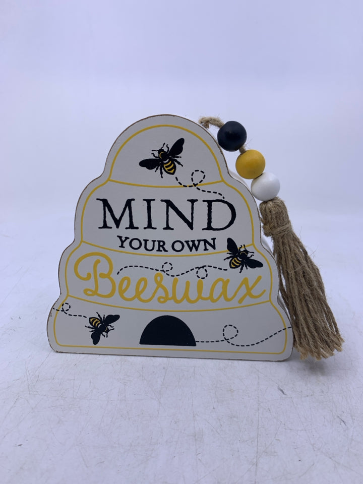 BEE HIVE SHAPED MIND YOUR OWN BEEWAX STANDING SIGN.