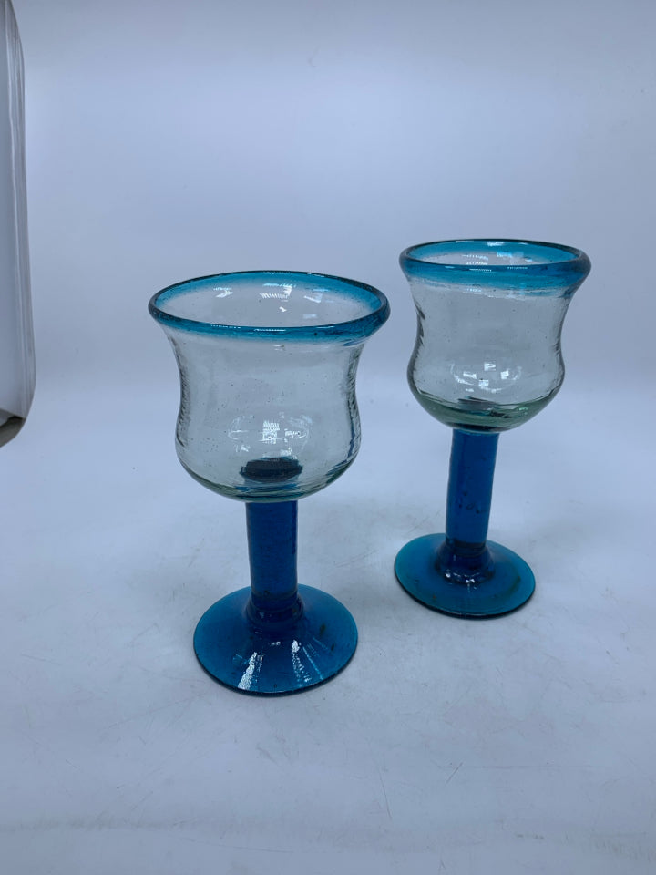 2 HAND BLOWN BLUE STEM WINE GLASSES.