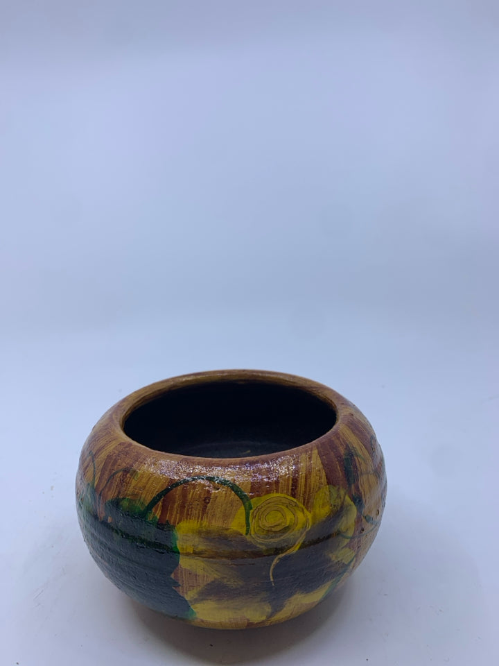 BROWN POTTERY PAINTED PLANTER.