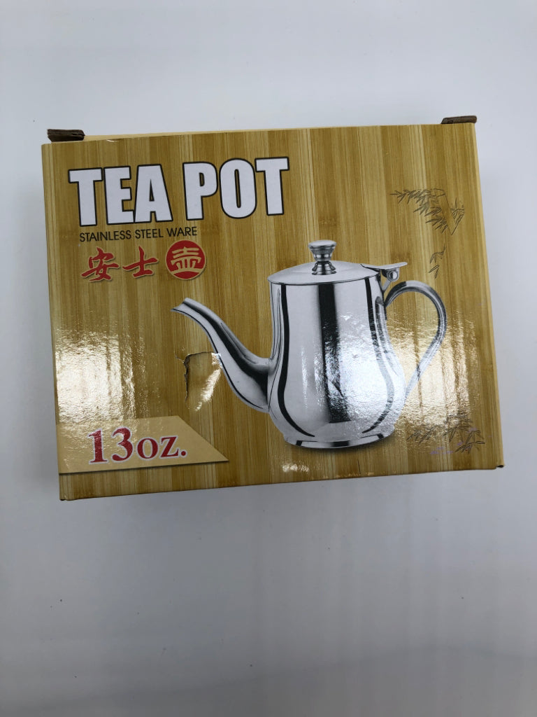 STAINLESS STEEL TEAPOT IN BOX.