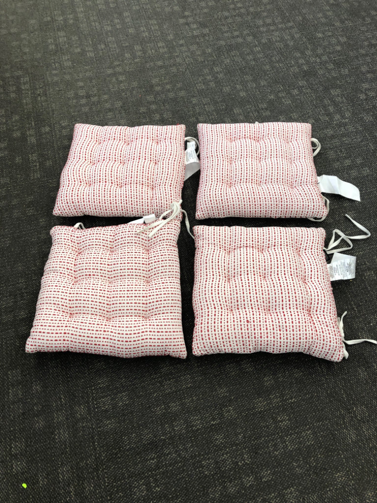 4 WHITE W/RED DOTS CHAIR CUSHIONS.