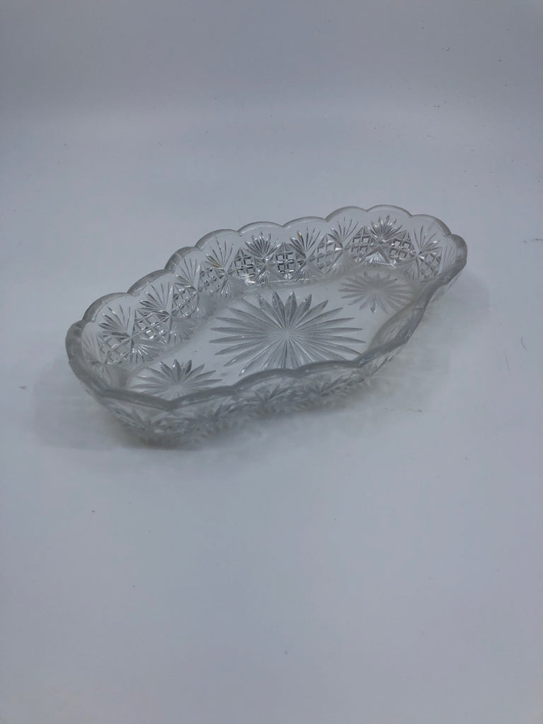 OVAL CUT GLASS PATTERN DISH W WAVY EDGES.