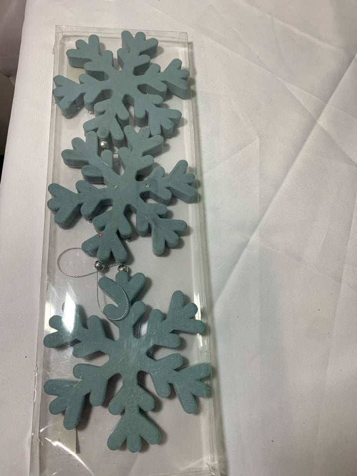 3 BLUE SNOWFLAKE ORNAMENTS.
