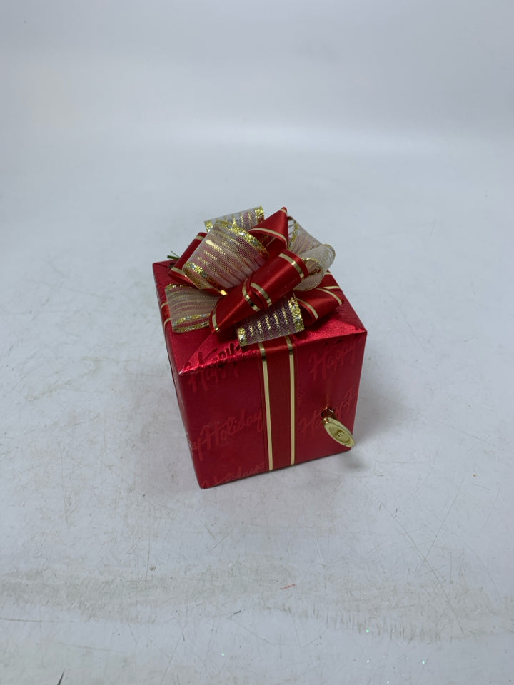 RED WRAPPED PRESENT " CHESTNUTS ROASTING" MUSIC BOX.