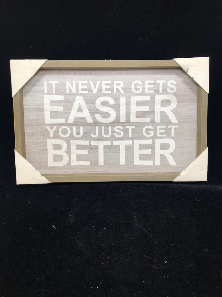 NEW IT NEVER GETS EASIER WALL HANGING.