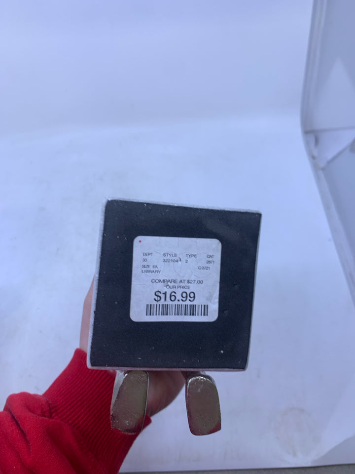 SQUARE MARBLE W/ SILVER METAL MAN PLAYING INSTRUMENT.