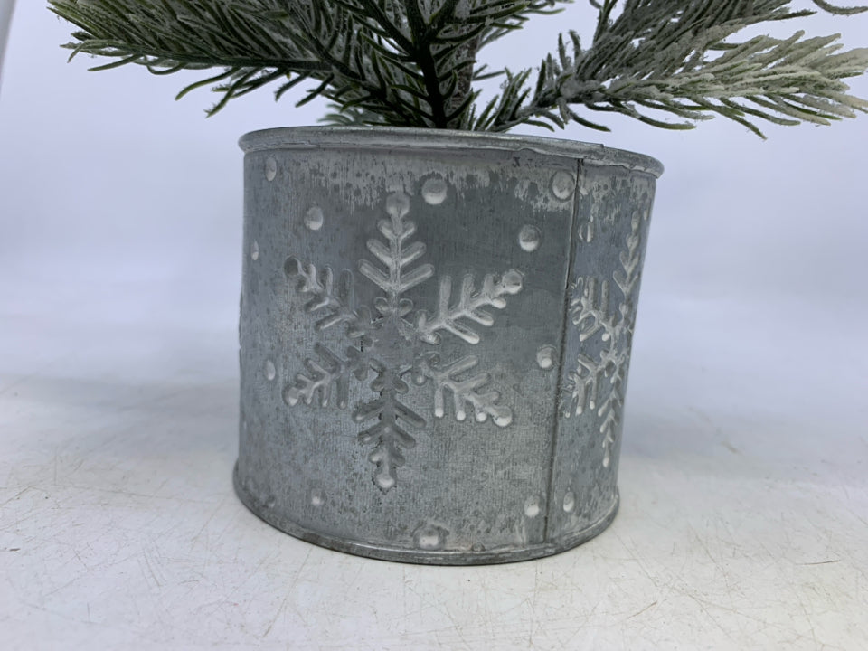 FAUX SNOWY TREE IN METAL SNOWFLAKE PLANTER.