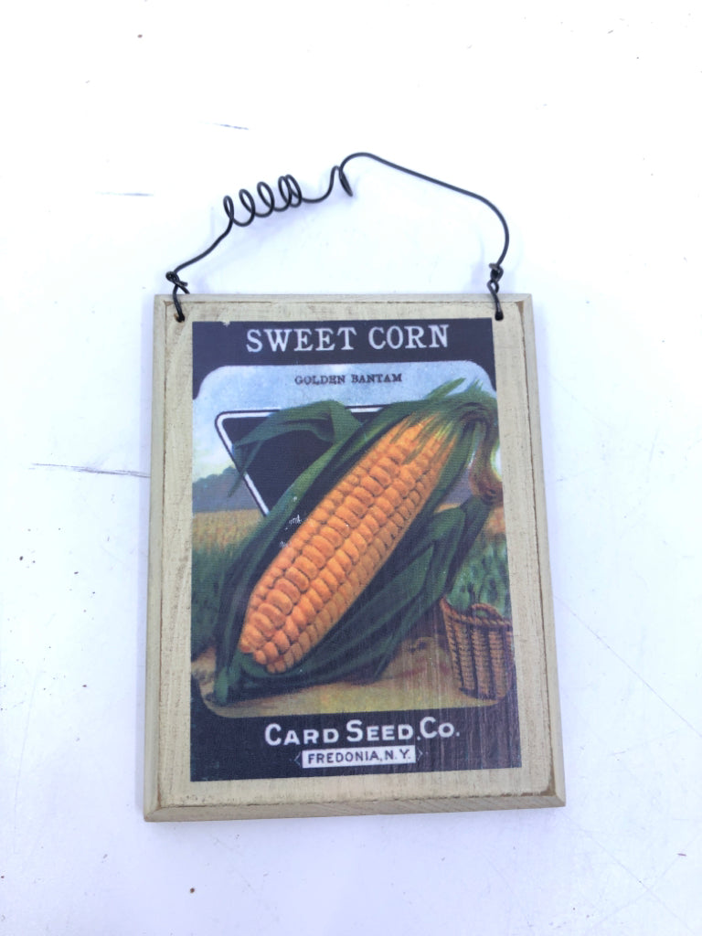 CORN SEED PACKET WALL HANGING.