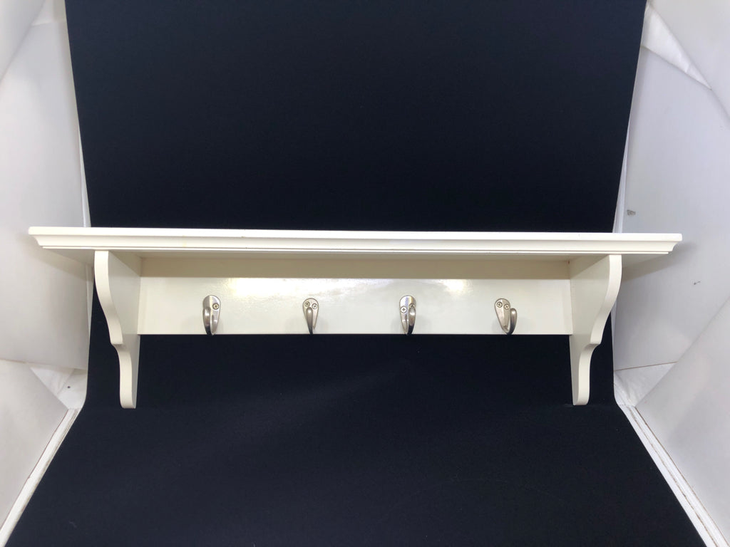 SMALL WHITE SHELF W 4 HOOKS.