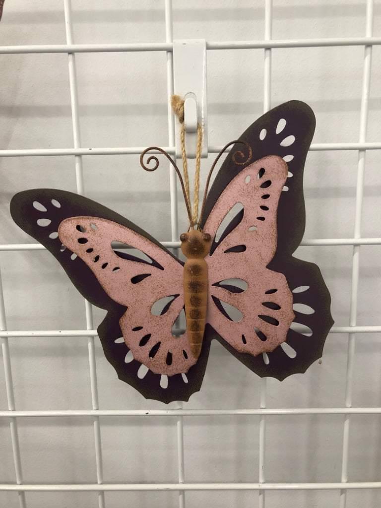 2 PINK METAL BUTTERFLY WALL HANGING.