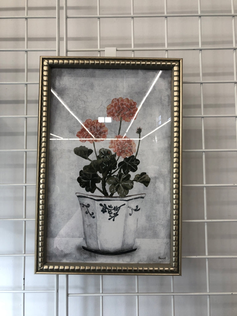 RED FLORAL IN SILVER FRAME WALL HANGING.