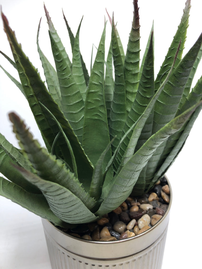 ALOE PLANT W/ROCKS IN METAL BASE.