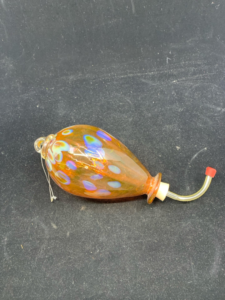 ORANGE BLOWN GLASS HUMMINGBIRD FEEDER.