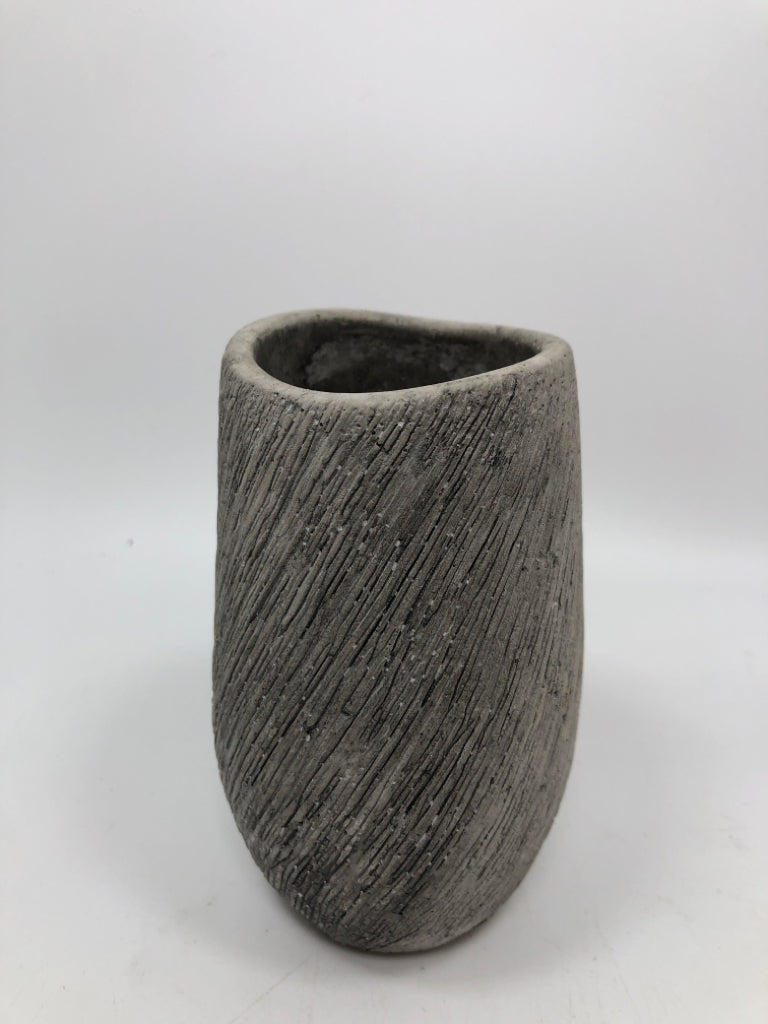 CEMENT SWIRL BUD VASE.