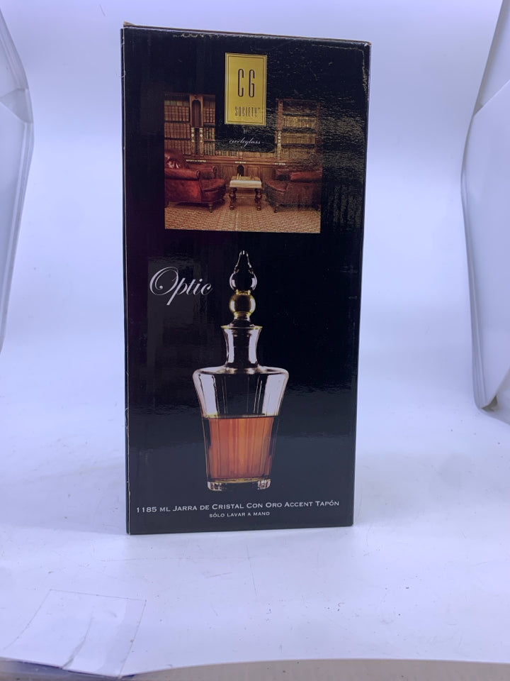 NIB GLASS DECANTER WITH GOLD ACCENTS STOPPER.