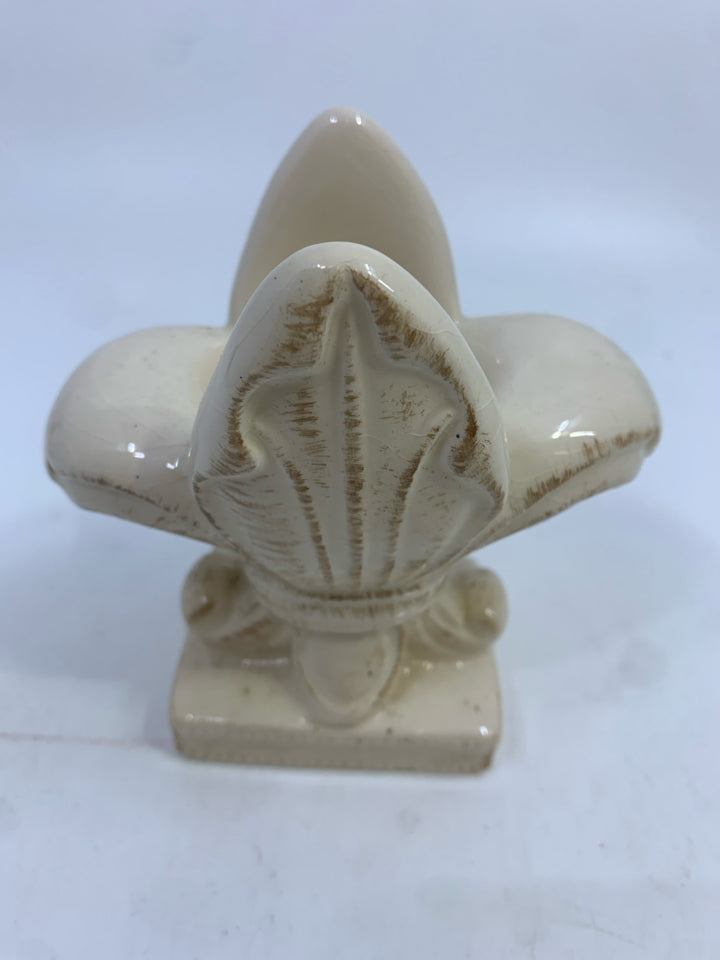 FLEUR-DE-LIS CERAMIC TEA-LIGHT HOLDER.