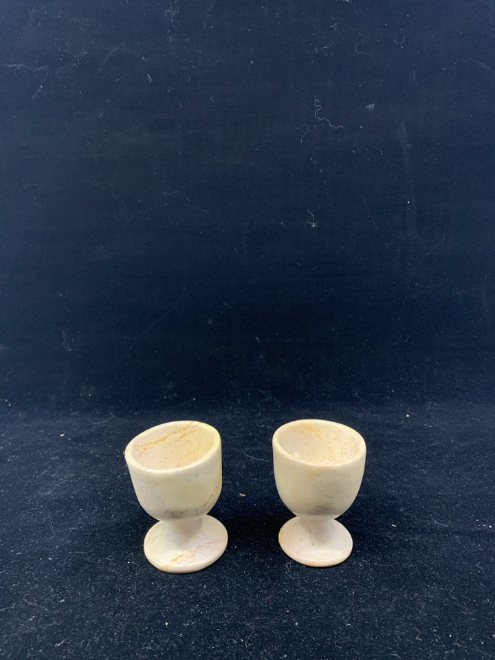 2 MARBLE EGG CUPS.