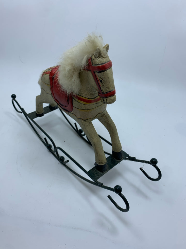 VTG WOODEN ROCKING HORSE W/GREEN METAL BASE.