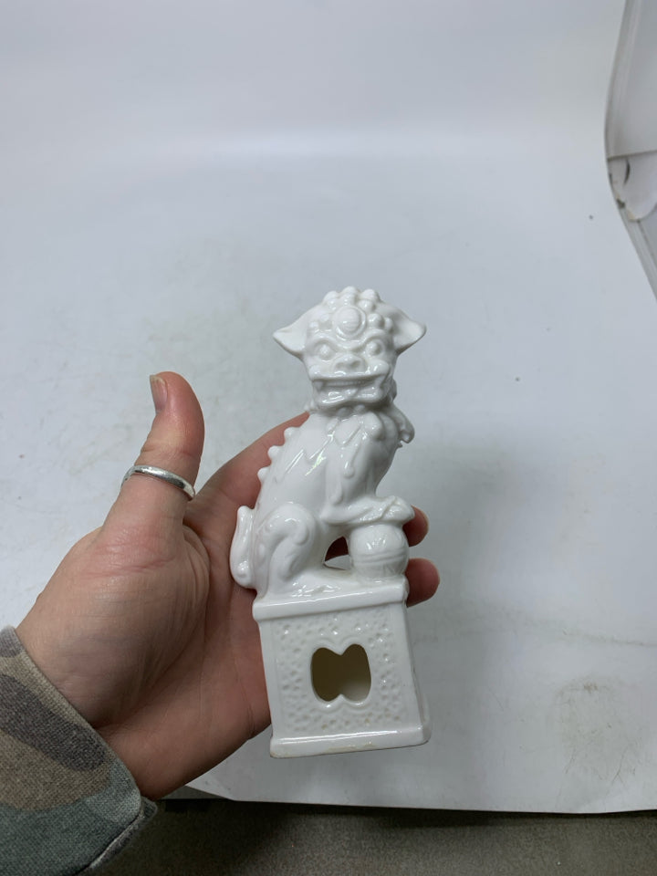 PORCELAIN FOO DOG FIGURINE.