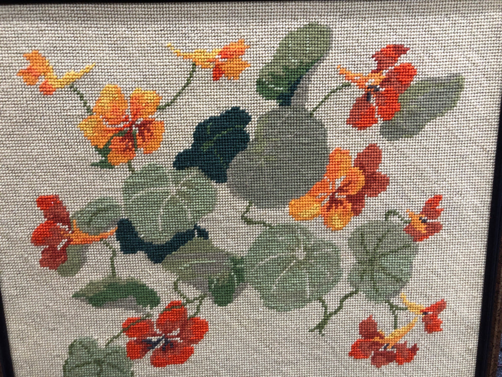 VTG ORANGE FLORALS FRAMED EMBROIDERY.