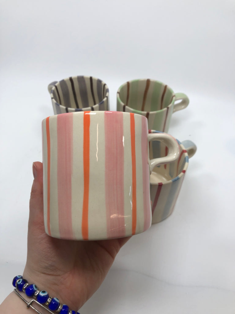 4 MULTI-COLOR STRIPED GLAZE MUGS.