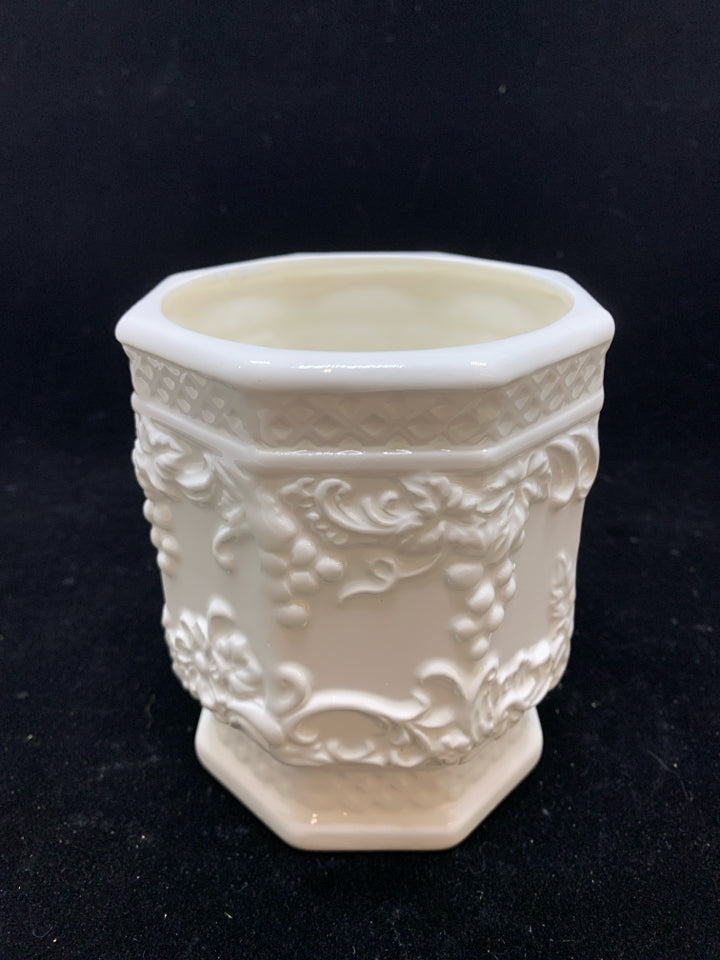 GRAPES EMBOSSED WHITE CERAMIC HEXAGON SHAPED PLANTER.