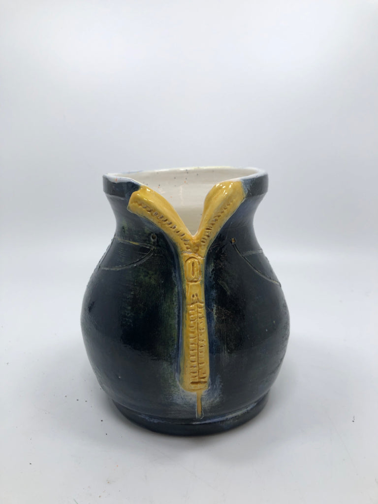 BLUE JEAN SHAPED POTTERY VASE.