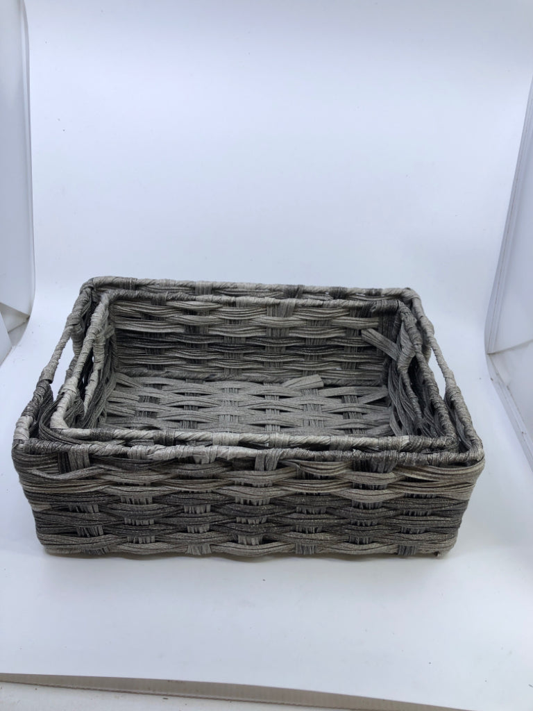 2 GREY WOVEN NESTING BASKETS W HANDLES.