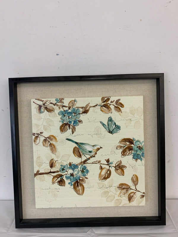 BIRD CANVAS ON DARK WOOD FRAME.