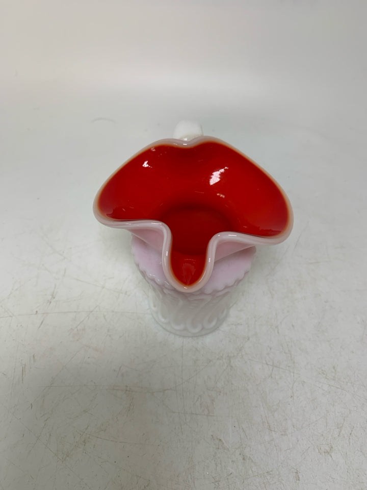 TEXTURED MILK GLASS W/ RED INTERIOR PINCHED SPOUT CREAMER.