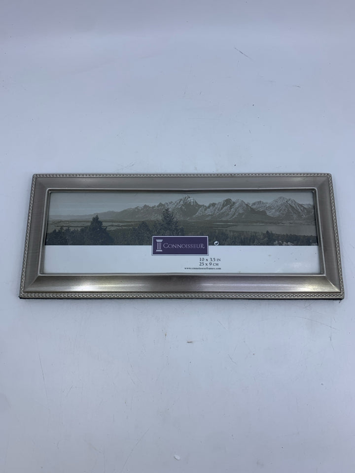 RECTANGLE SILVER BEADED FRAME.