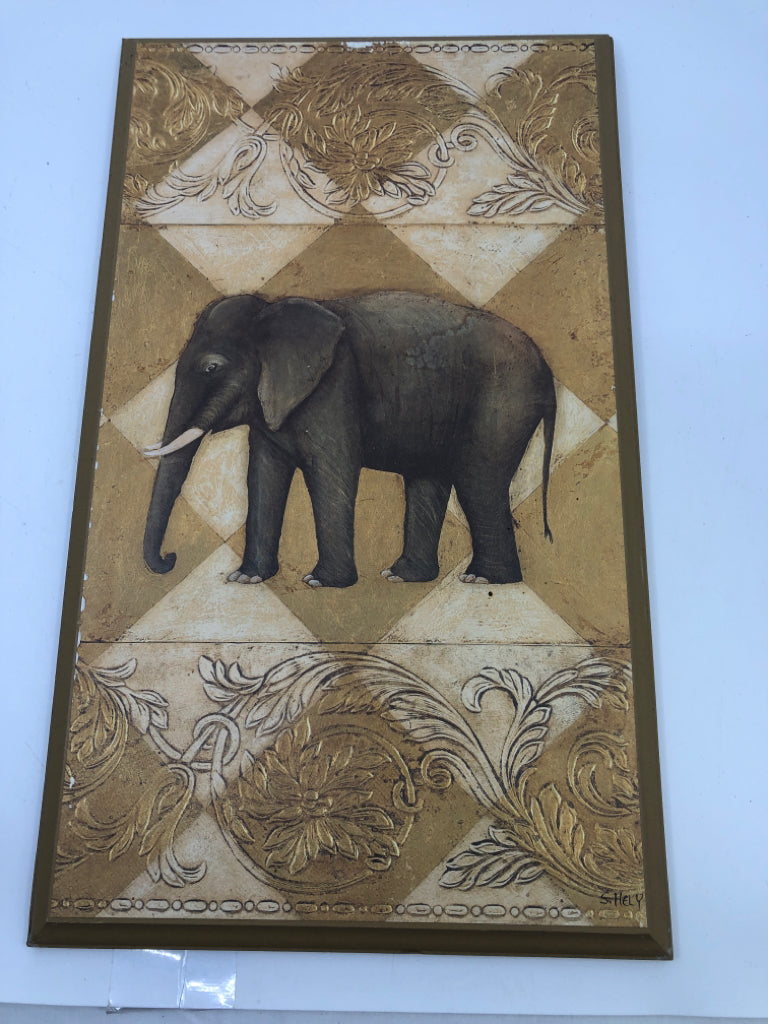 WOOD ELEPHANT AND LEAVES WALL HANGING.