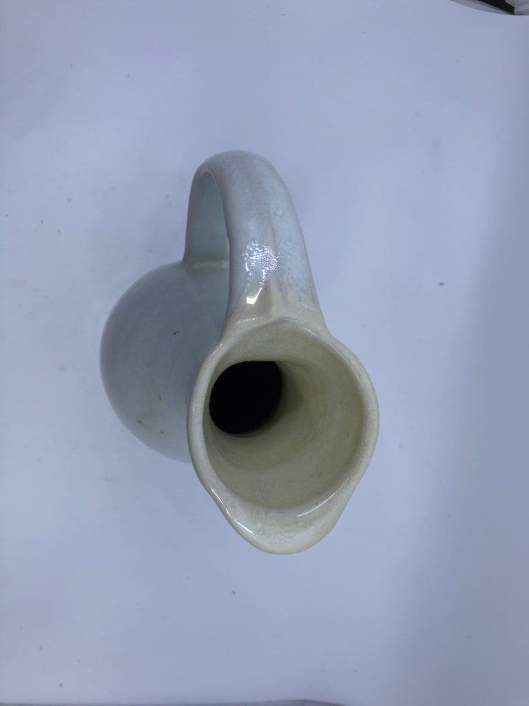 CREAM POTTERY PITCHER.
