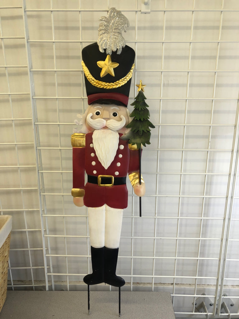 METAL NUTCRACKER YARD STAKE SIGN.
