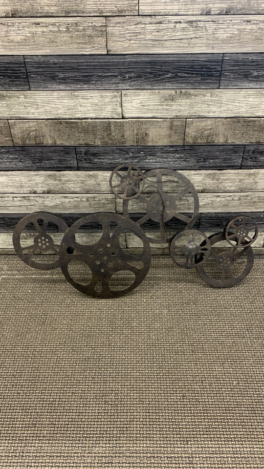 BRONZE DUSTED METAL FILM REEL WAL DECOR.