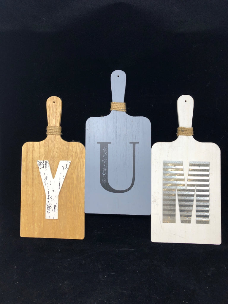 YUM PADDLE WALL DECOR.