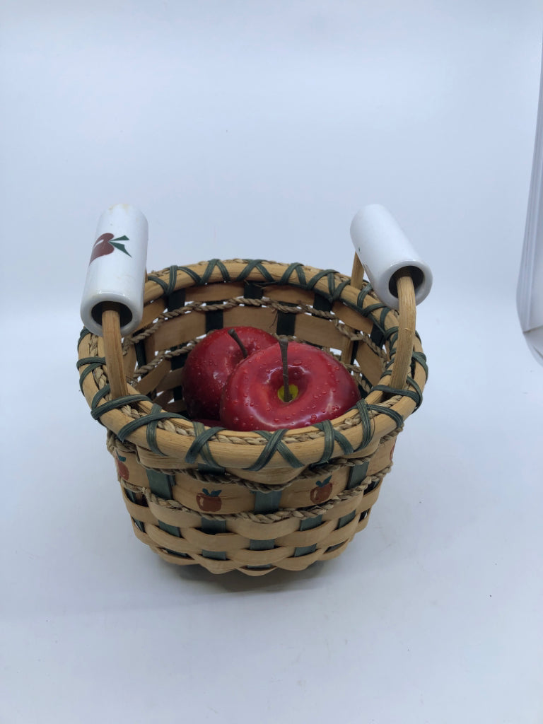 WICKER APPLE BASKET W/4 FAUX APPLES AND CERAMIC APPLE HANDLES.