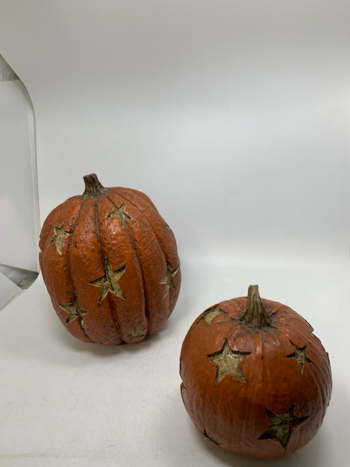 2 RESIN STAR CUTOUT PRIMITIVE STYLE PUMPKINS.
