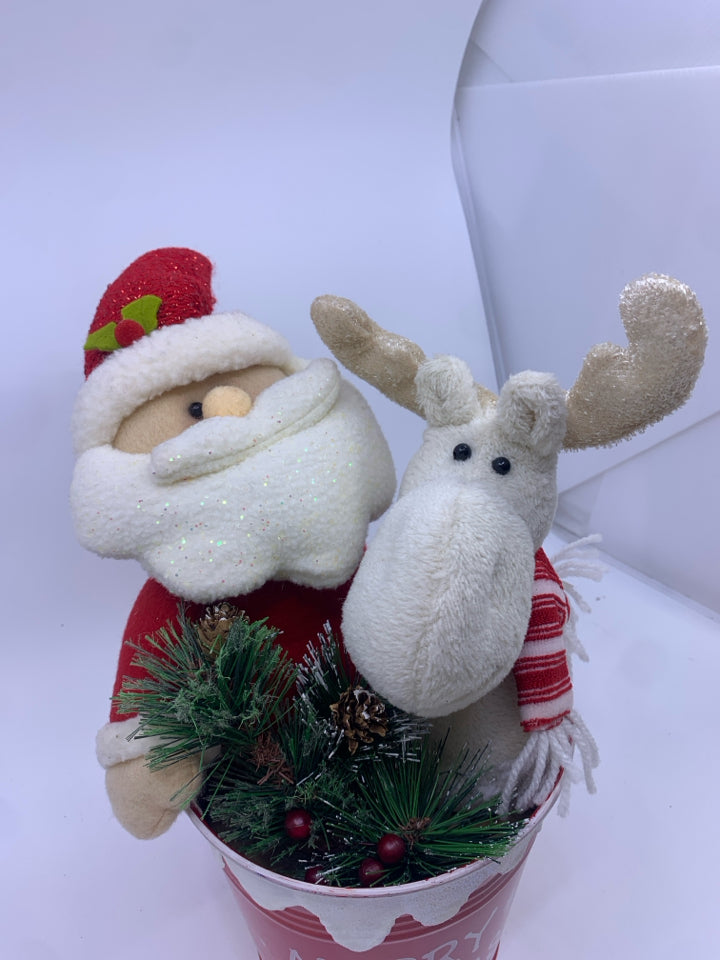 PLUSH SANTA & REINDEER IN RED BUCKET.