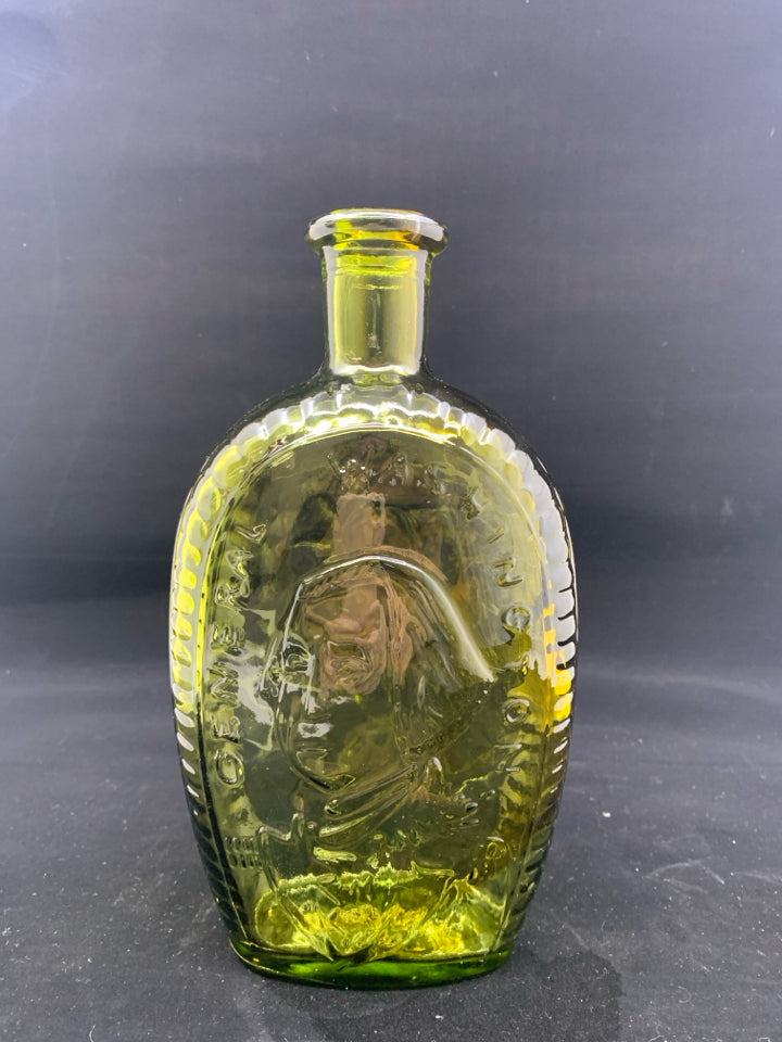 VTG GREEN GLASS EMPTY BOTTLE W EMBOSSED FACE.