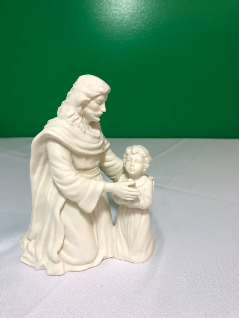 CREAM CERAMIC MAN AND CHILD.