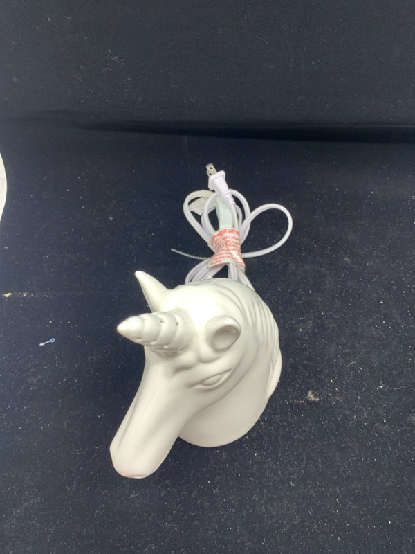 WHITE CERAMIC UNICORN LIGHT.