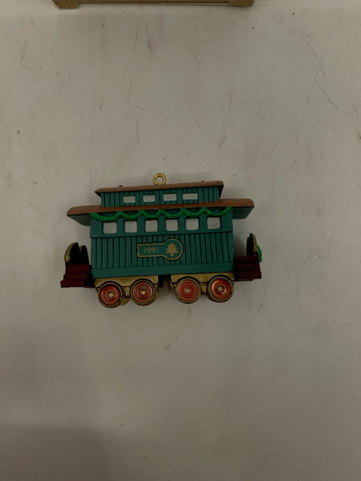 HALLMARK PASSENGER CAR ORNAMENT IN BOX.